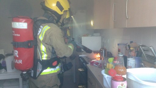 Firefighter in kitchen 