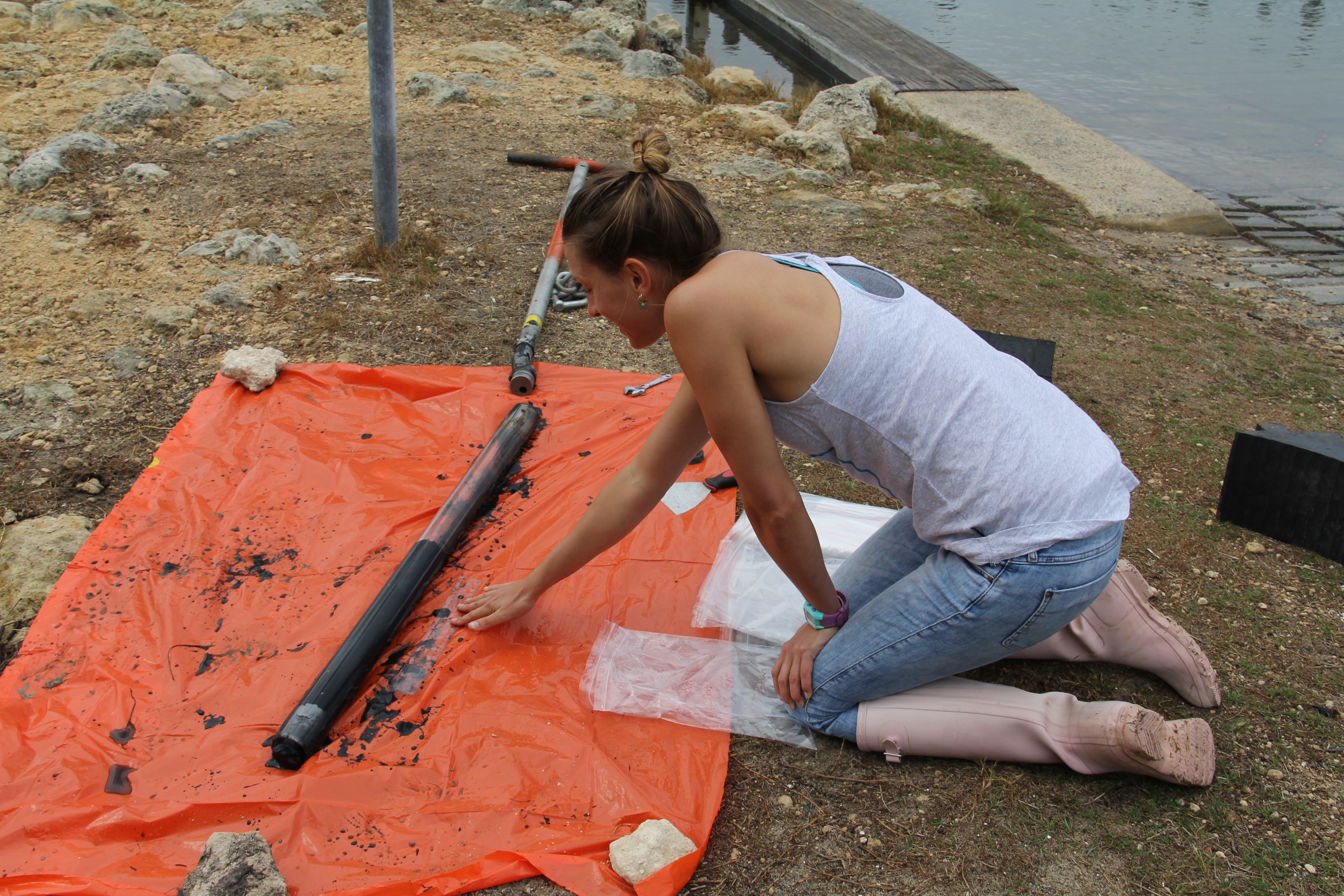 Examining_marine_sediments_-_credit_Girish_Choppala.JPG