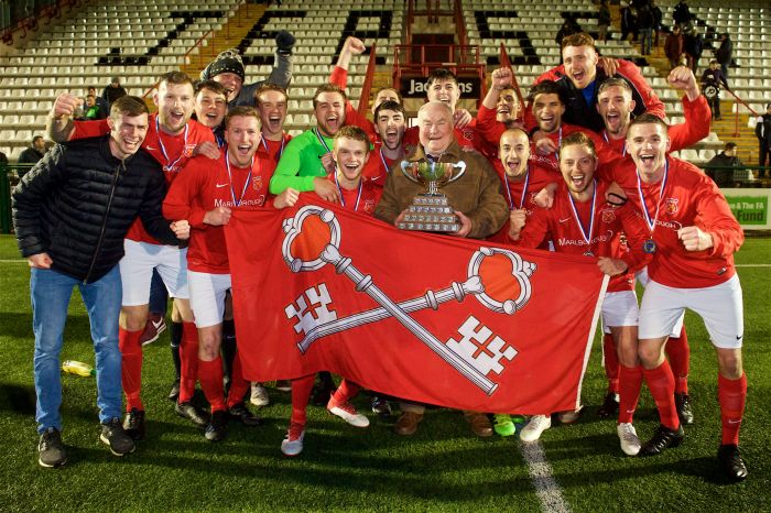 Tom du Feu (centre) holding the Le Riche Cup final trophy in 2019, after St. Peter's victory over St. Paul's. (Rob Currie)