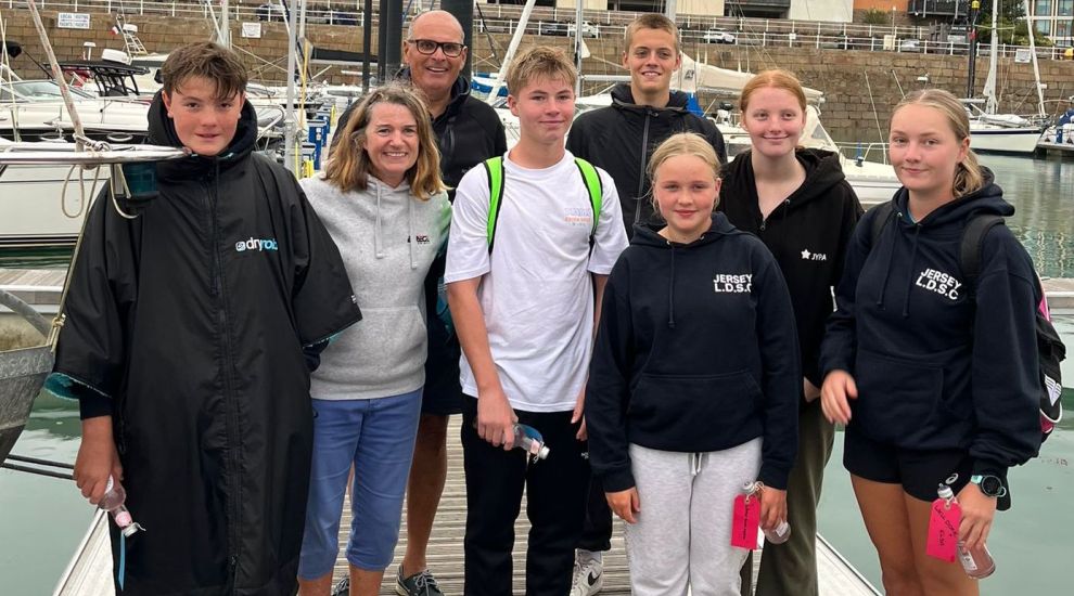 Young 'whales' triumph in round-island swim relay