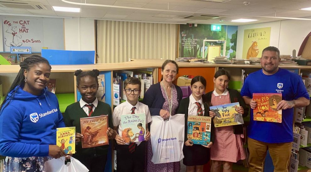 Standard Bank donates books to local school to celebrate Africa Day