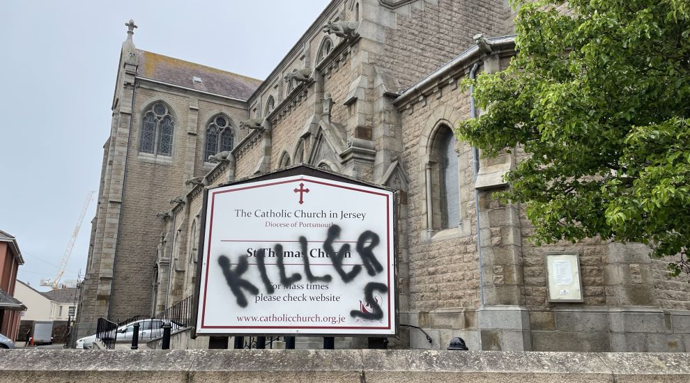 Man charged over graffiti at church