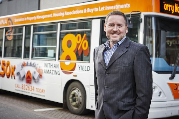 New local company wins historic bus advertising contract