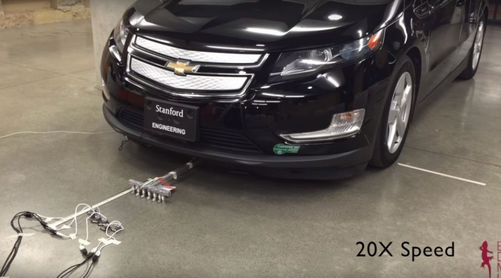 Watch these tiny microbots pull a full-sized car