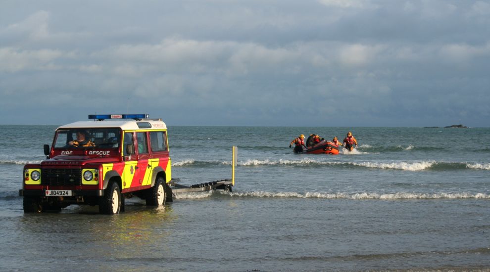 Two adults and a child rescued after kayak capsizes