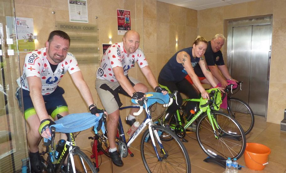 Standard Chartered staff raise £1,300 after eight hours in the saddle