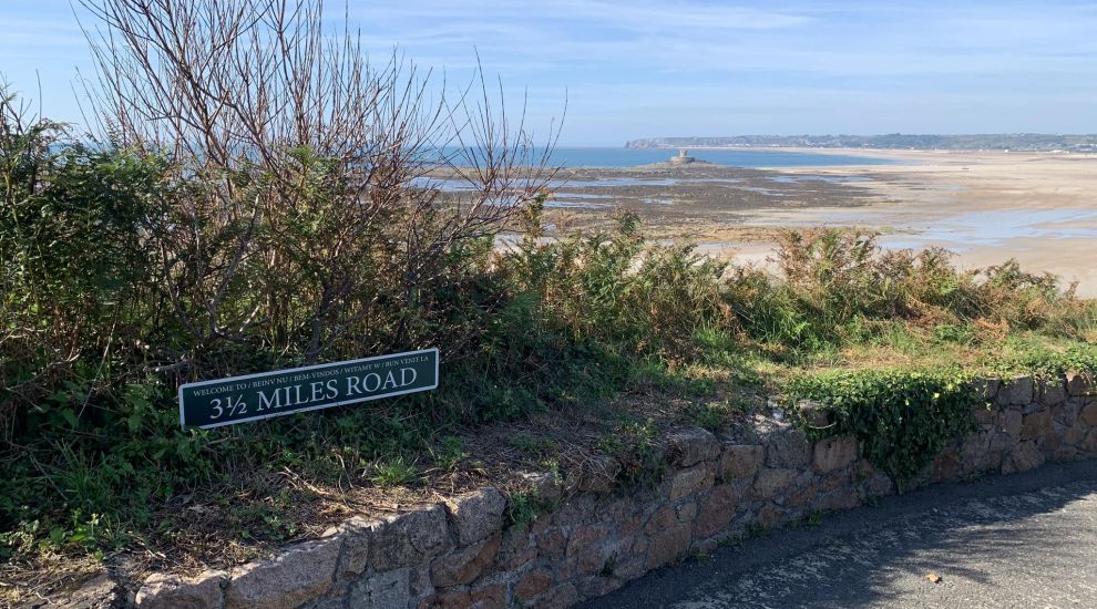 Who's behind the '3½ Miles Road' sign?