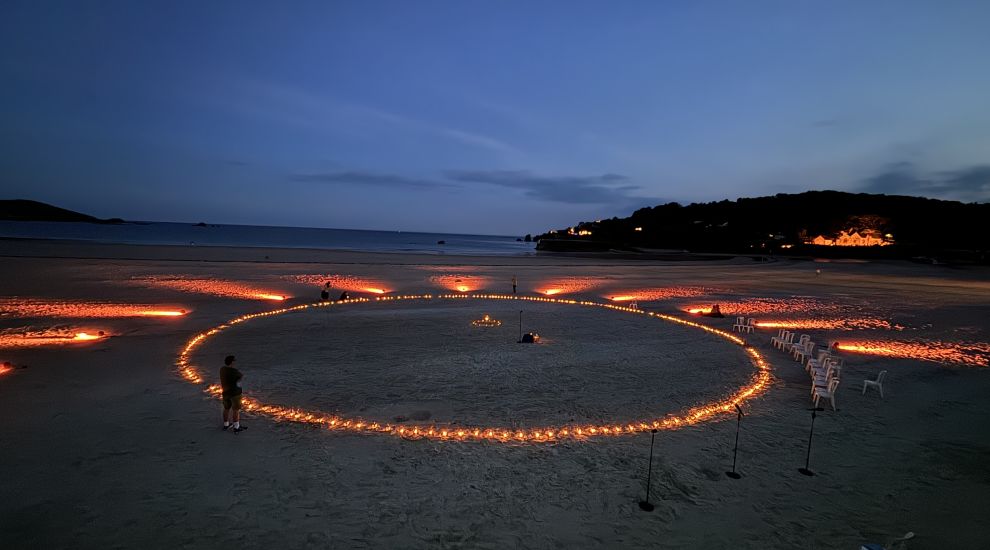 GALLERY: Islanders remember loved ones at candlelit beach gathering