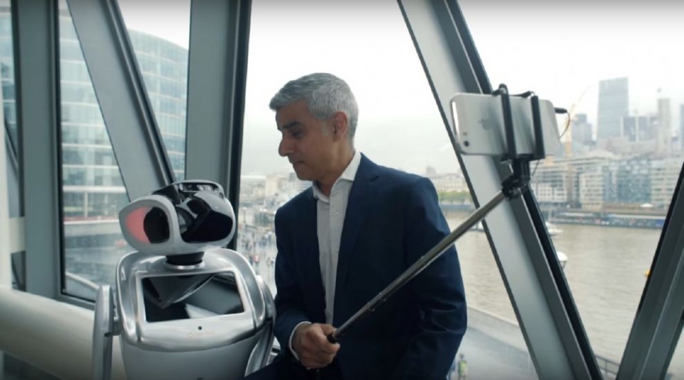 Mayor of London Sadiq Khan takes selfie with a robot to promote London Tech Week